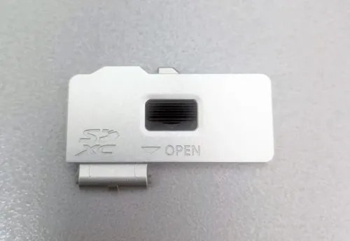 OlympusE-M10MarkIIBatteryCompartmentcoversilverwithoutsalespackaging